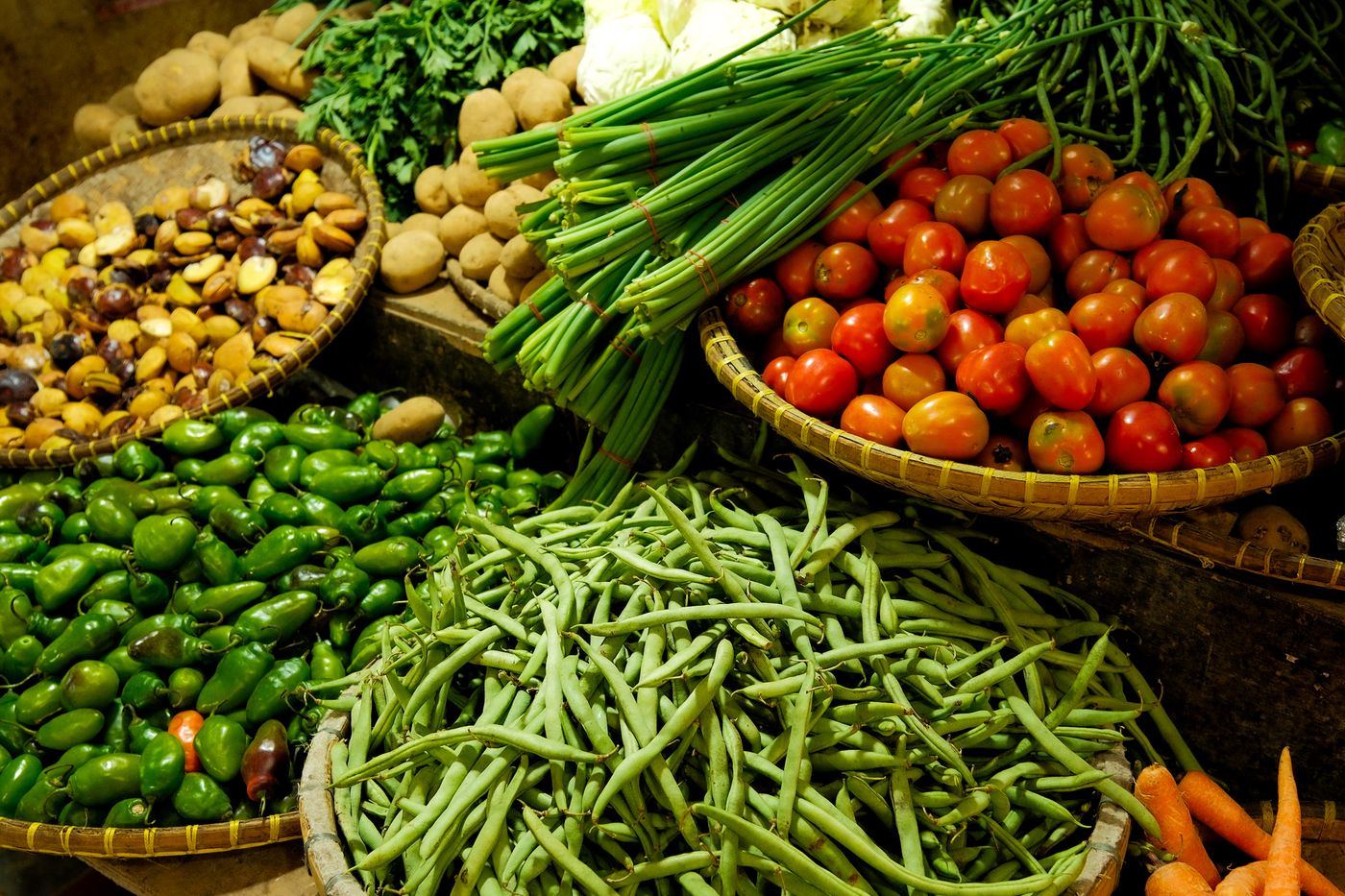 Fresh vegetables and greens at a produce market